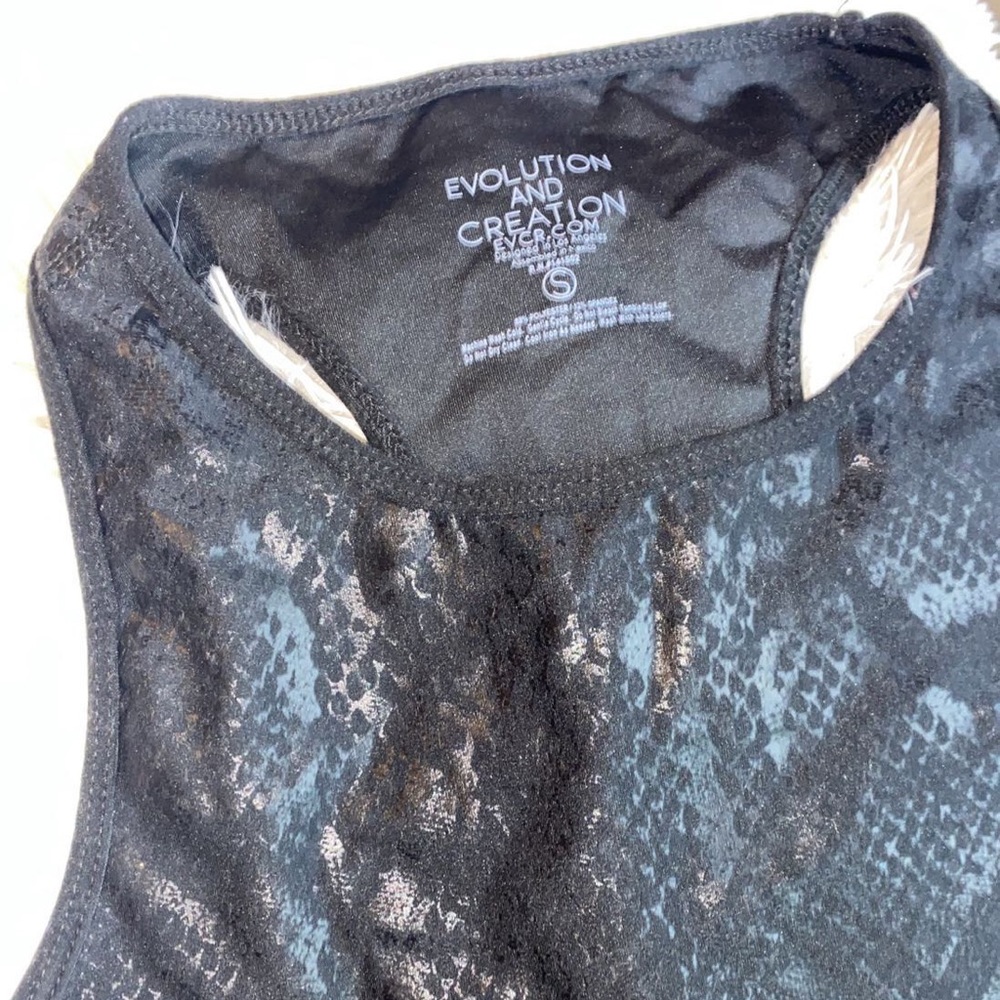 Workout sleeve less top in snack print!